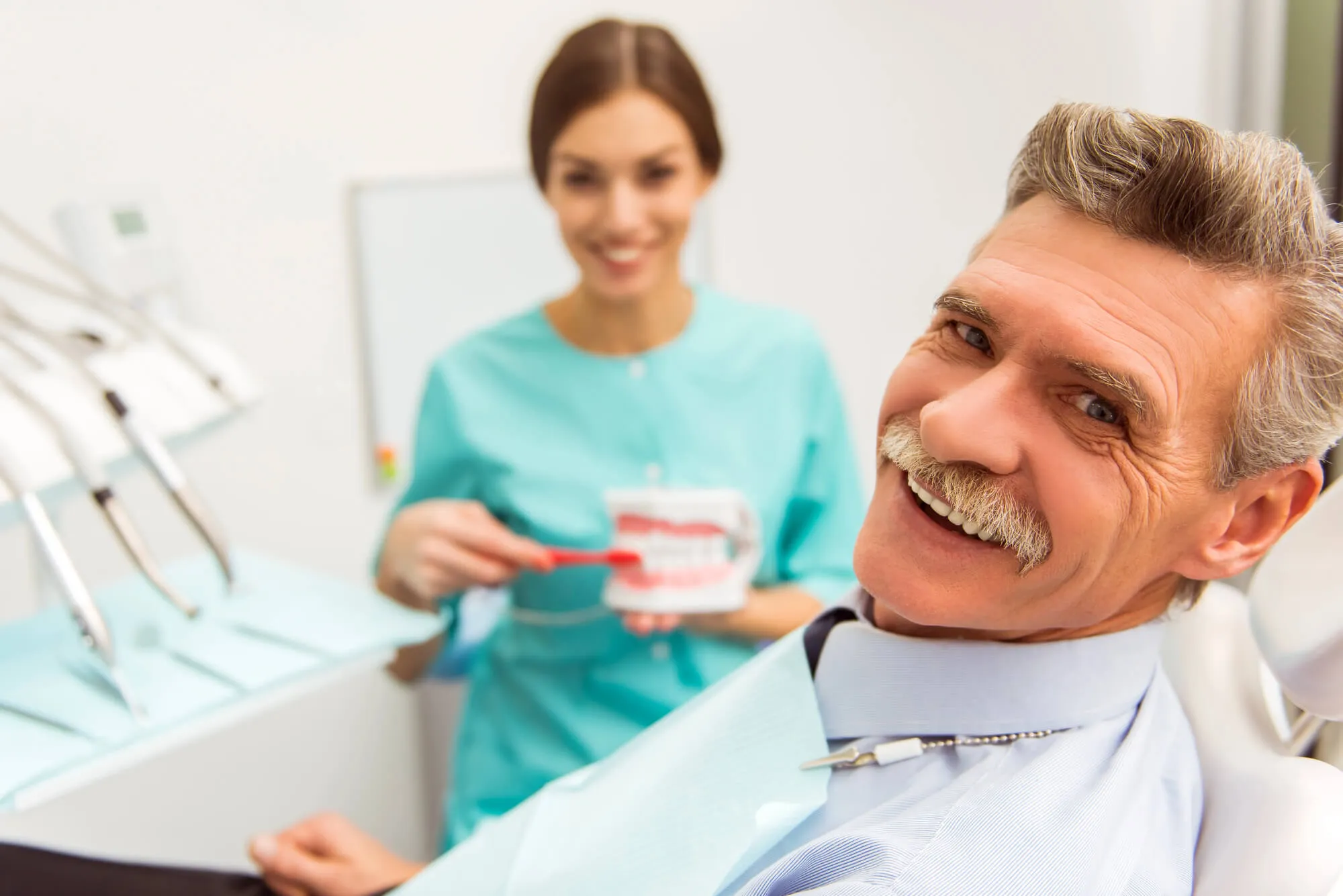 patient getting emergency partial dentures naples