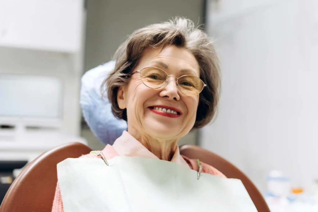 senior wearing affordable dentures naples