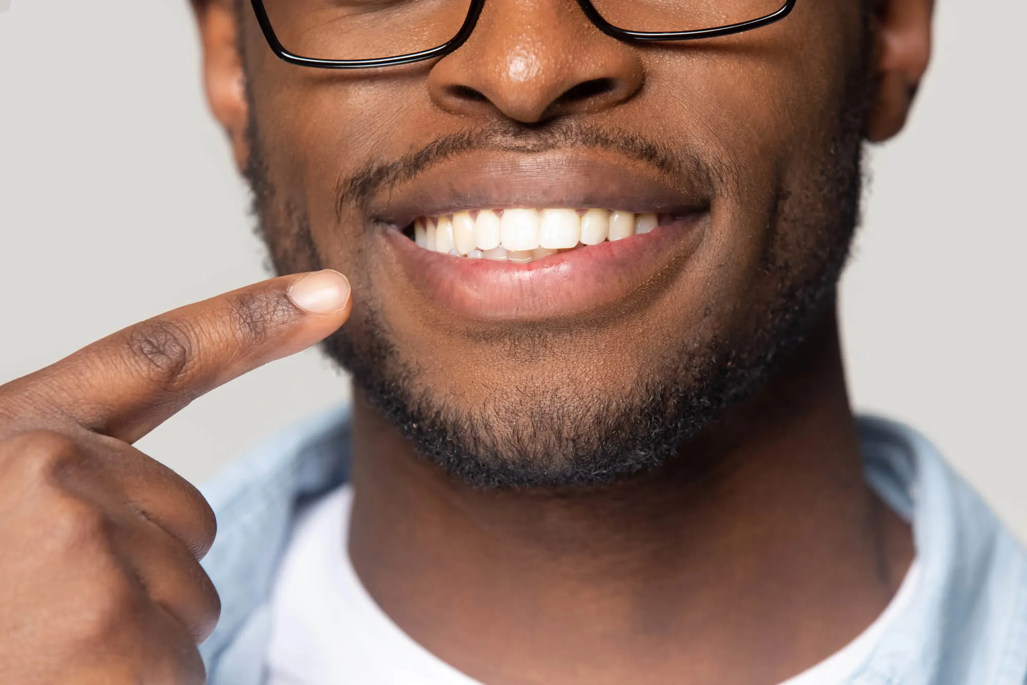 man wearing implant dentistry naples
